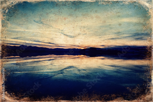 Beautiful landscape, lake with mountain in background, old photo effect.
