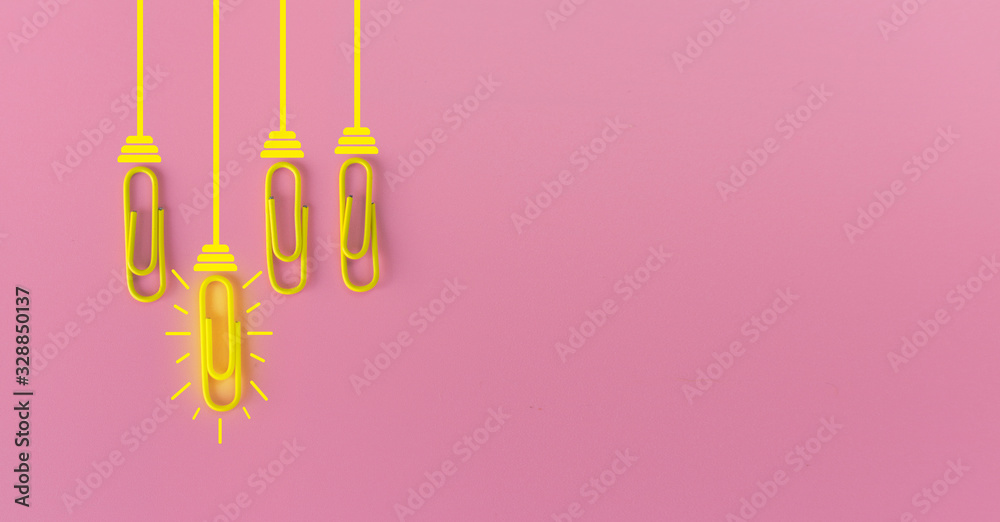 Great ideas concept with paperclip,thinking,creativity,light bulb on blue background,new ideas concept.
