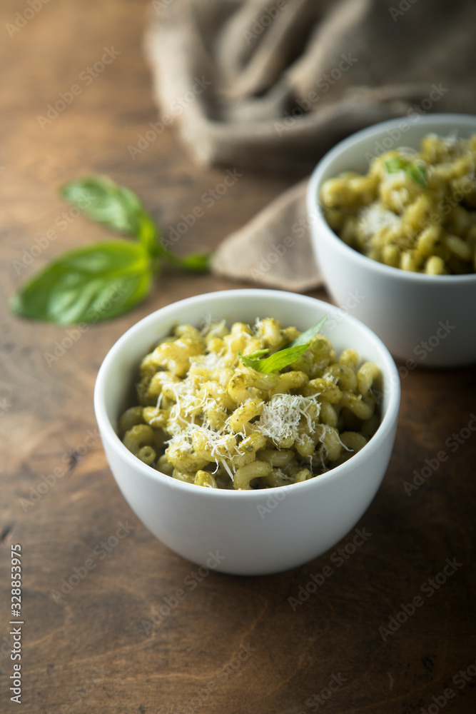 Pasta with pesto sauce and cheese Pasta with pesto sauce and cheese