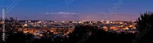 Skyline Night panorama of Rome taken from the Janiculum Hill on historic center during blue hour