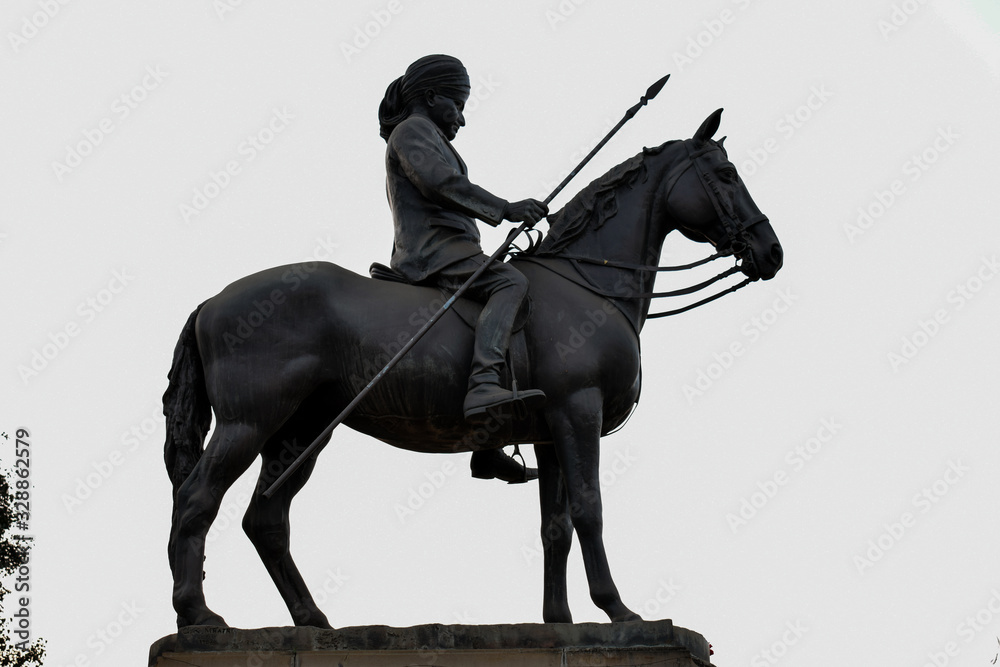 Fototapeta premium Statue of great Indian warrior carved using black granite stone
