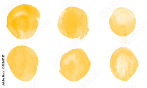 Beautiful yellow watercolor blot background. Set of yellow circles brushes
