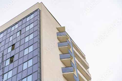 apartment buildings on a clear day view from below