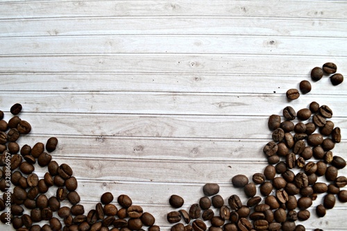 coffee beans on wooden background photo