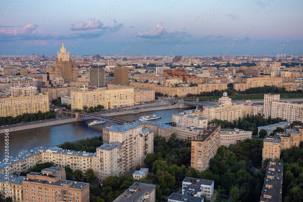 Moscow. Russia. Panorama of Moscow from a height. Moscow river. Residential and business buildings of the capital against the gray sky. Building of the Ministry of foreign Affairs of Russia.