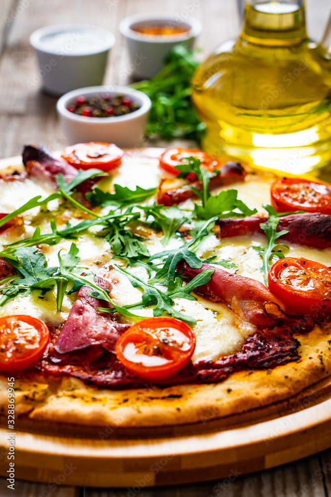 Margherita pizza on wooden table