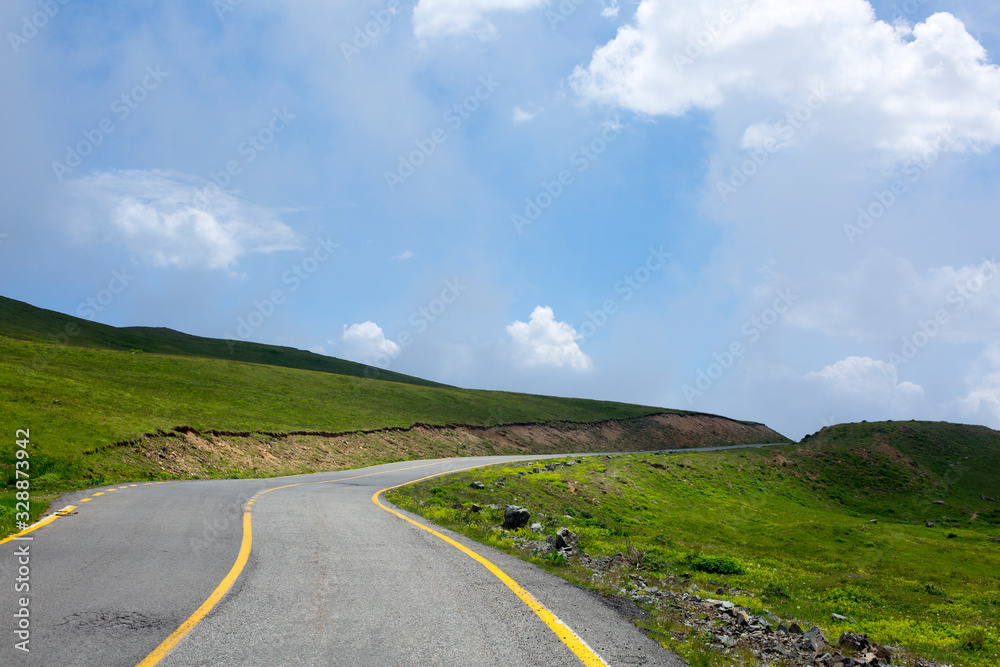 asphalt yellow stripe nature road leading to uzungol