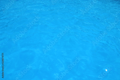 Blue Water Background. Water surface texture. Blue water ripple surface