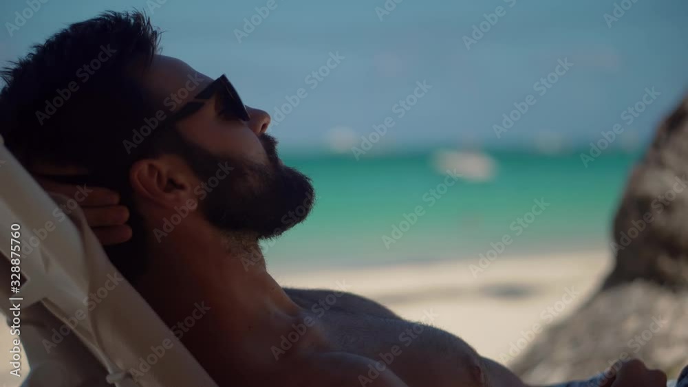 Man Relaxing On Vacation Caribbean Tropical Beach.Summer Sunbathing ...