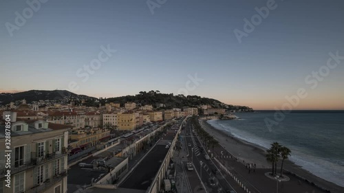 Wallpaper Mural Day to night time-lapse of full moon rising over old town of Nice and Promenade des Anglais Torontodigital.ca