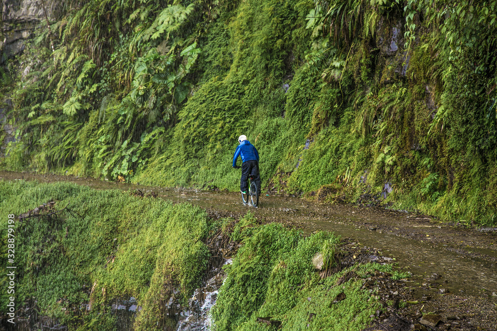 Fototapeta premium Participants of the descent of The Worlds Most Dangerous Road , called 