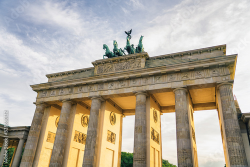 Brandenburg gate at sunset, german iconic interest location in Berlin