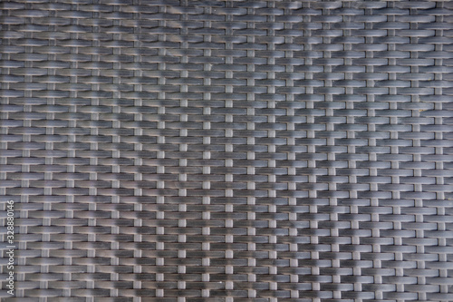 Black plastic weave texture background