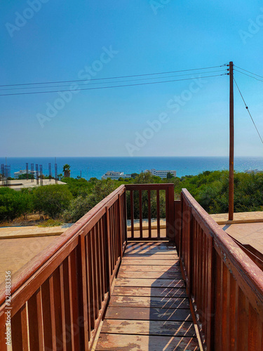 View to the Mediterranean sea from wooden stairs in Cyprus © topolov_nick