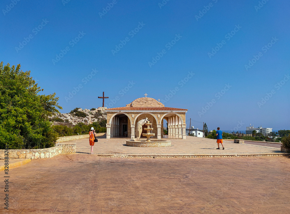 Obraz premium Ayia Napa, Cyprus - September 09, 2019: Square in front of Agios Epiphanios church with the Jonah's fountain