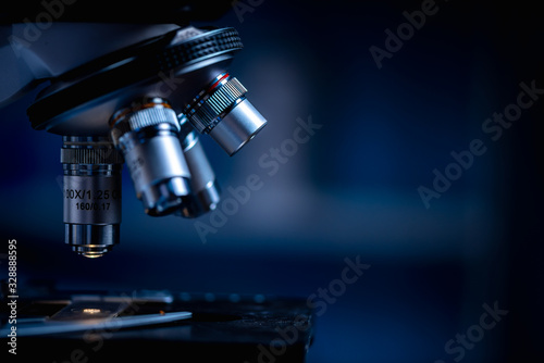 Closeup of Scientific microscope data analysis in the laboratory, medicine equipment research setting in lab for chemistry analysis photo