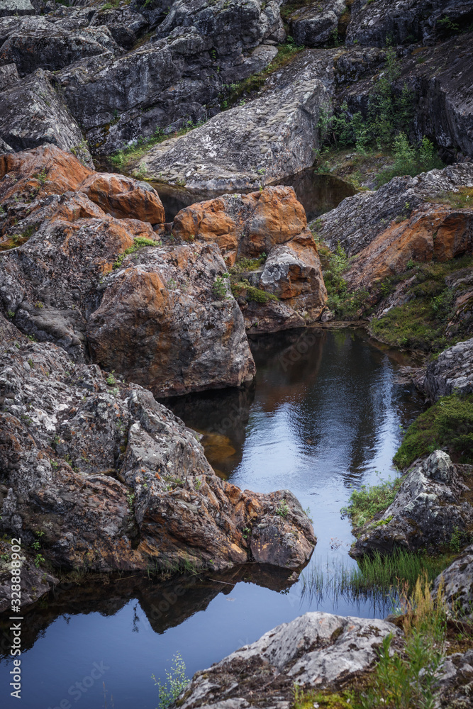 Fototapeta premium Rocks and remnants of a dry river at Döda Fallet in Sweden