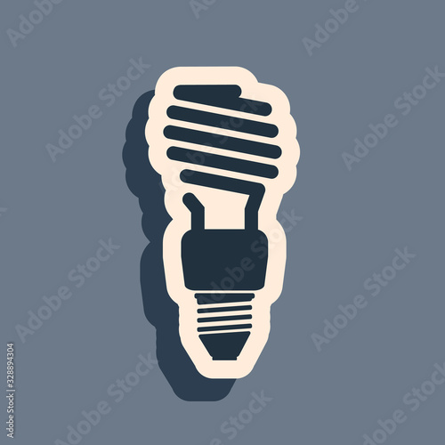 Black Energy saving light bulb icon isolated on grey background. Long shadow style. Vector Illustration