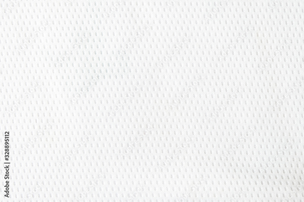 Selective focus, White mesh fabric background. cloth sport wear texture for  exercise. light weight, good air flow, cool and easy to dry from sweat.  abstract wallpaper with copy space for text. Stock