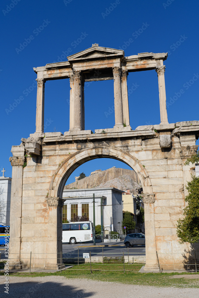Hadrian's gate with Acropolis hill at the background, Athens, Greece