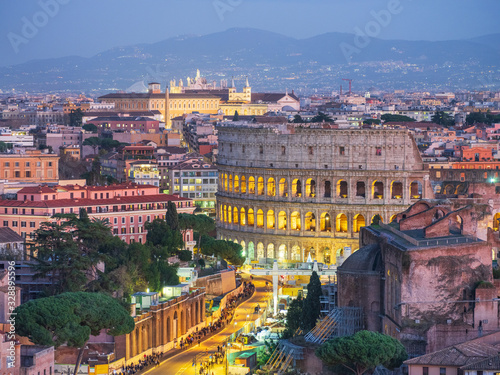 night street lights around colosseum in twilight in Rome