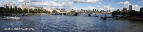 panoramic view of the River Thames showing bridge and skyline