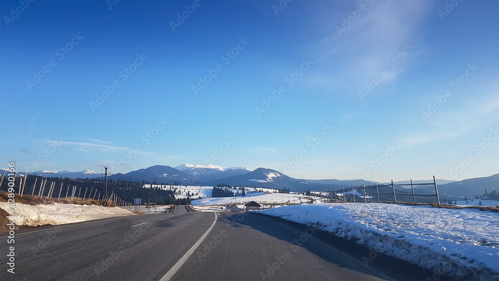 Road through the scenic landscape to the destination. travel into the mountains Road through the scenic landscape to the destination. travel into the mountains
