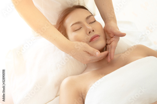 Young Woman during Spa Salon Body massage Hands Treatment.