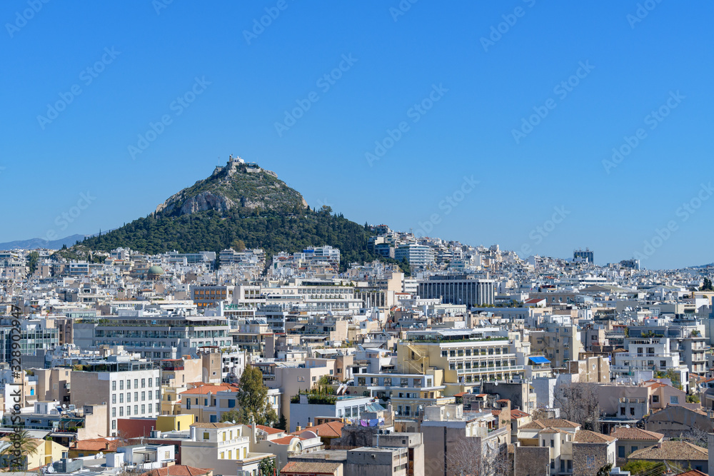 Athens cityscape from Anafiotika with Lycabettus hill in the background