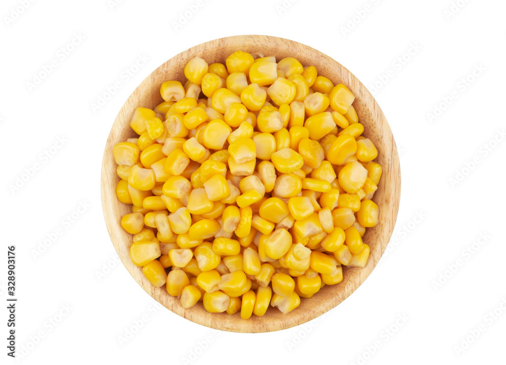 Canned corn in wooden bowl isolated on white background Canned corn in wooden bowl isolated on white background