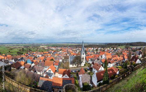 scenic view from Muenzenberg castle to village of Muenzenberg and Wetterau area in Hesse, Germany