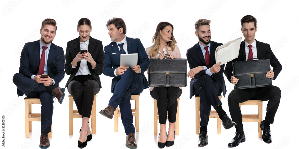 6 businessmen talking on phone, holding newspaper and briefcase