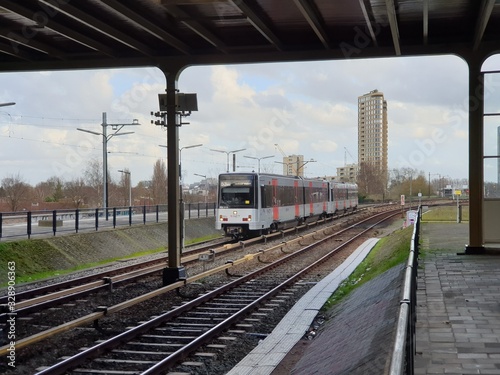 Canvas Print CAF M4 metro train on line 53 heading Amsterdam Central Station arriving at the
