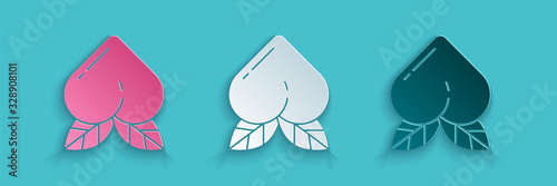 Paper cut Peach fruit or nectarine with leaf icon isolated on blue background. Paper art style. Vector Illustration