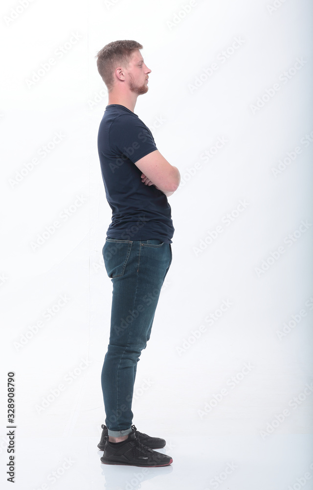 serious young man looking forward . isolated on white serious young man looking forward . isolated on white