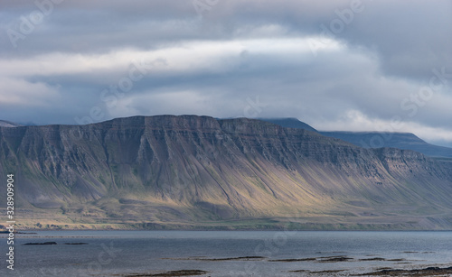 Landscape of westfjord with cloudy sky - Iceland.