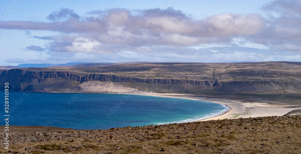 Beach By The Arctic Sea In Iceland with crystal water