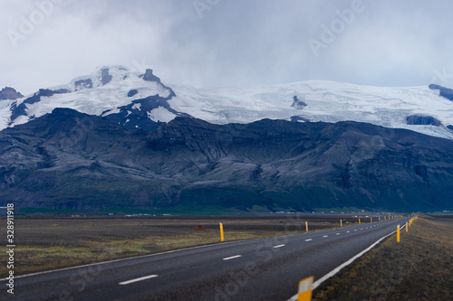 Scenic landscape with beautiful road, Mountain with glacier and snowy peak © Hladchenko Viktor