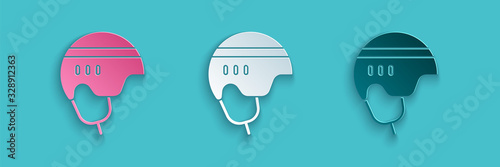Canvas Print Paper cut Hockey helmet icon isolated on blue background
