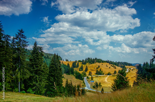  A stunning view of Rhodope Mountains in Bulgaria. Meadows of the Rozhen near Smolyan, the site of The Rozhen National Folklore Fair. (Bulgarian: Роженски ливади, Родопи) photo
