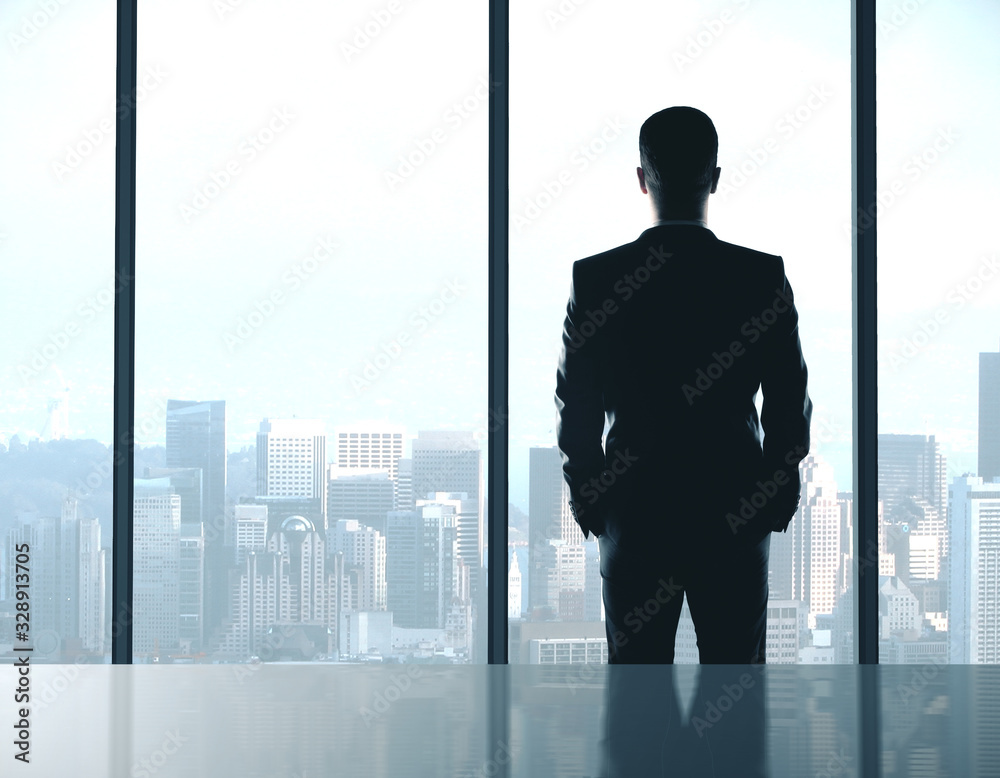 Fototapeta premium Businessman standing in office