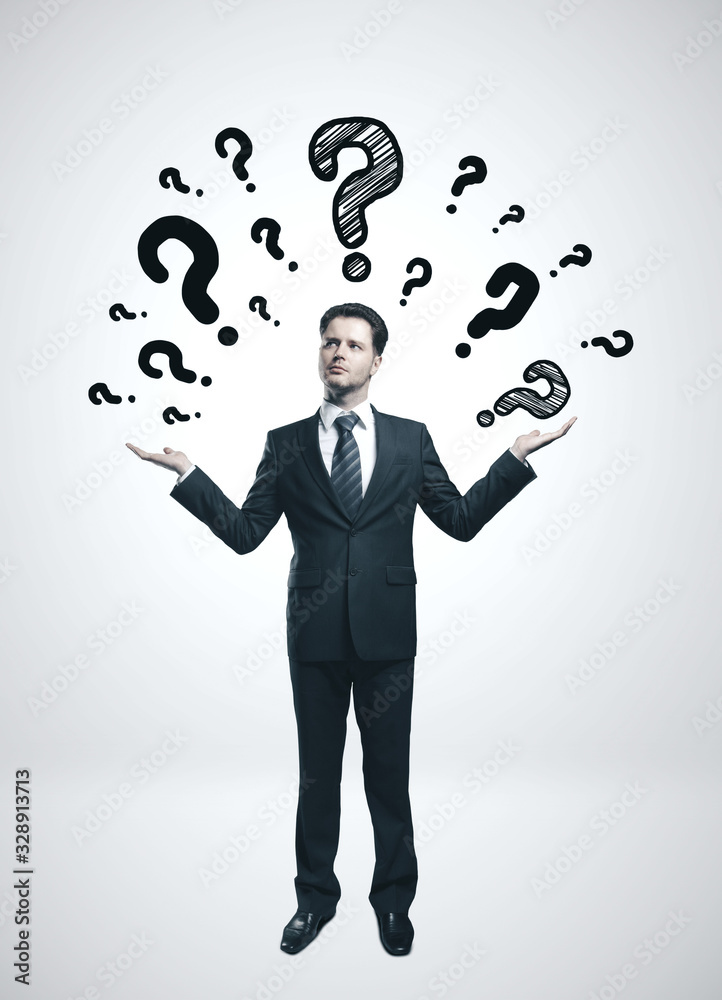 Businessman with drawing question mark Businessman with drawing question mark