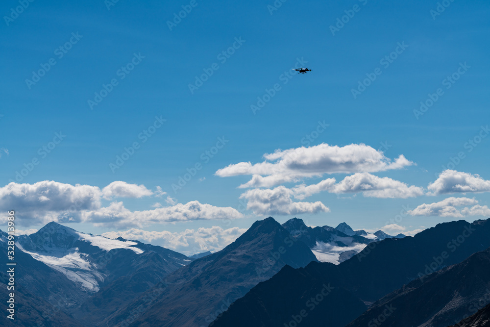Drone flies mountains and peaks landscape in the background. Hills covered with glaciers and snow, natural environment. Hiking in the Gaislach. Ski resort in Tirol alps, Austria, Europe Drone flies mountains and peaks landscape in the background. Hills covered with glaciers and snow, natural environment. Hiking in the Gaislach. Ski resort in Tirol alps, Austria, Europe