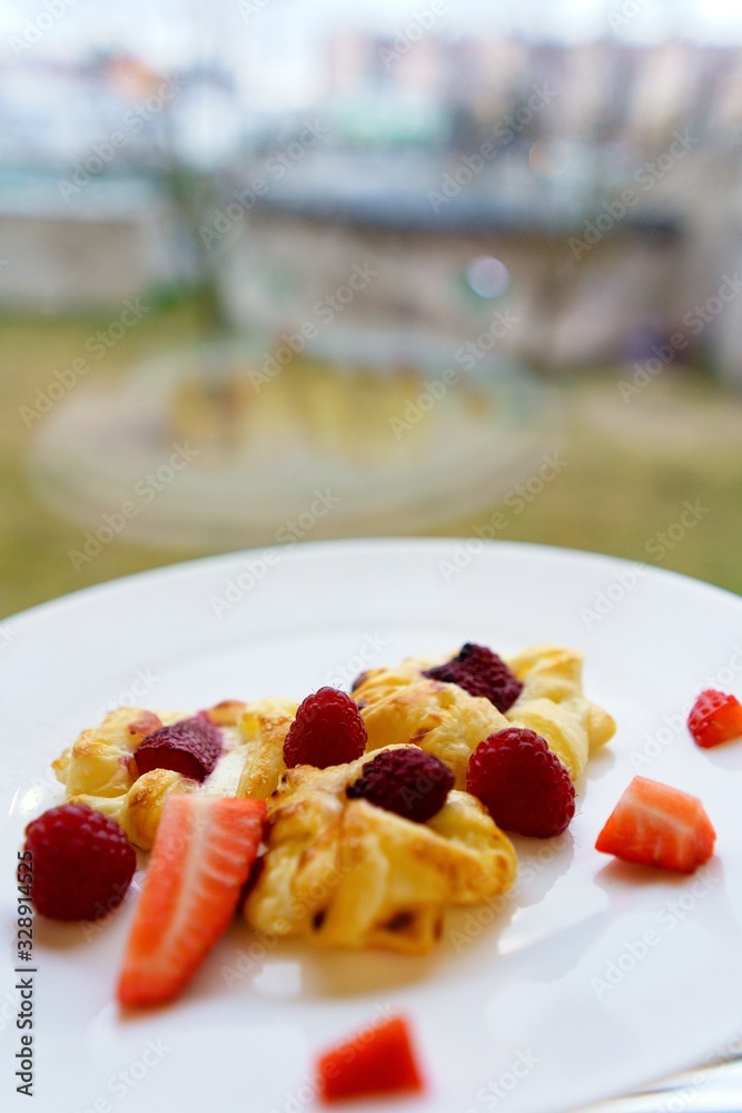 puff pastry cookies with organ and raspberries, strawberries