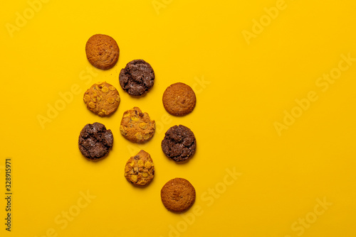package set of various oat cookies flat lay isolated on the colorful background