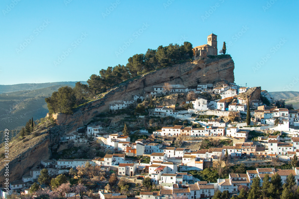 Castle of the beautiful village of Montefrio, Granada (Andalusia), Spain. Views of the town and the castle on top of the mountain.