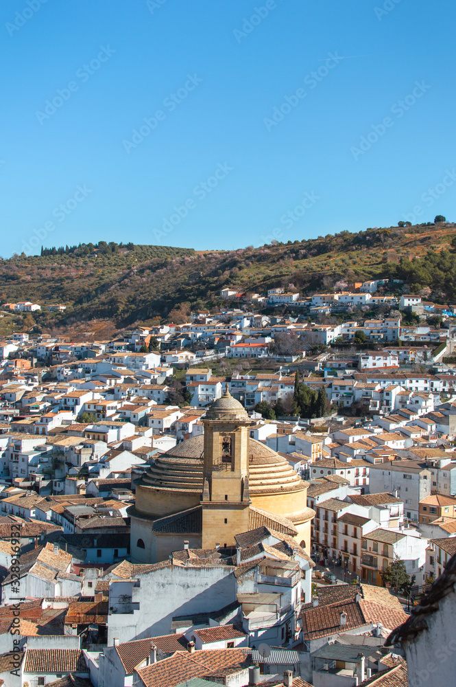 Fototapeta premium Beautiful village of Montefrio, Granada (Andalusia), Spain. Views of the town, the church (Iglesia de la Encarnación) and mountains.