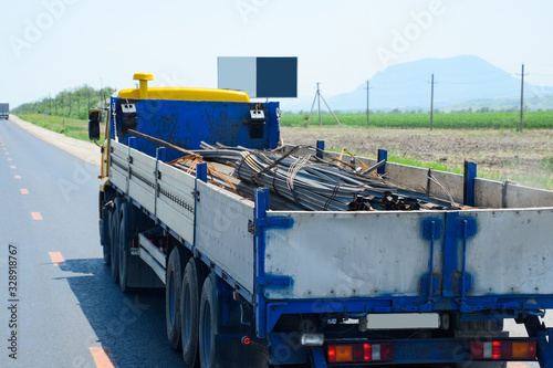 Photo transportation of metal rental products in back of a truck.