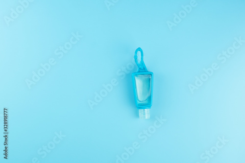 wash hand sanitizer gel dispenser on blue background, against Novel coronavirus or Corona Virus Disease (Covid-19). Antiseptic, Hygiene and Healthcare concept