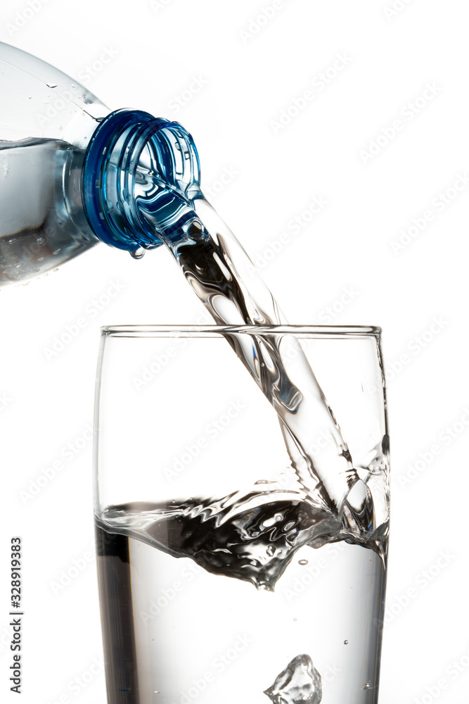 water flowing from bottle to glass water flowing from bottle to glass